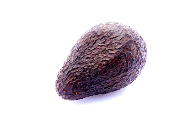 Czarny owoc awokado — Zdjęcie stockowe