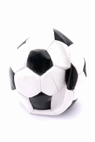 Плоский футбольний м'яч — стокове фото