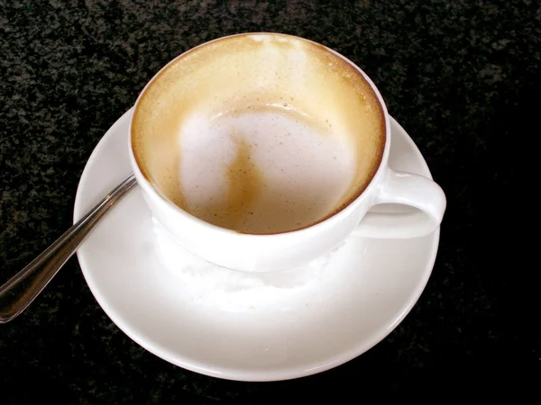 Almost finished cappuccino — Stock Photo, Image