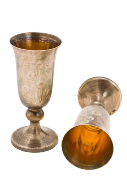 Kiddish cup with wine clipart