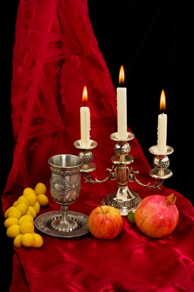 Cup fruits and candles — Stock Photo, Image