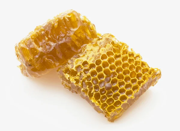 Favo de mel isolado em branco — Fotografia de Stock