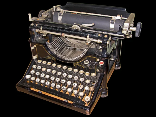 Vecchia macchina da scrivere isolata in nero — Foto Stock