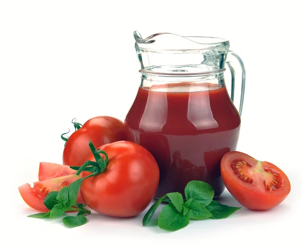 Kannan tomatjuice och frukter — Stockfoto