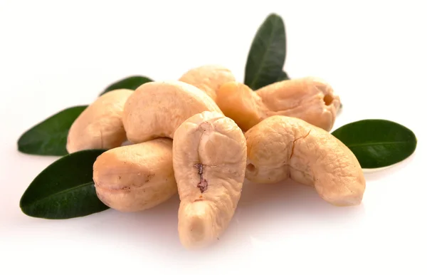 Ripe cashew nuts with leaves — Stock Photo, Image