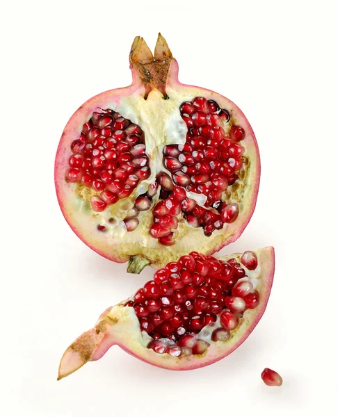 stock image Pomegranate whole and open-face with seeds