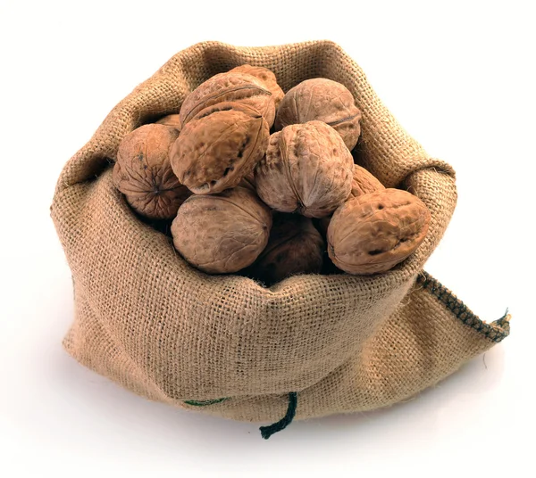 Nueces en el saco de tejido —  Fotos de Stock