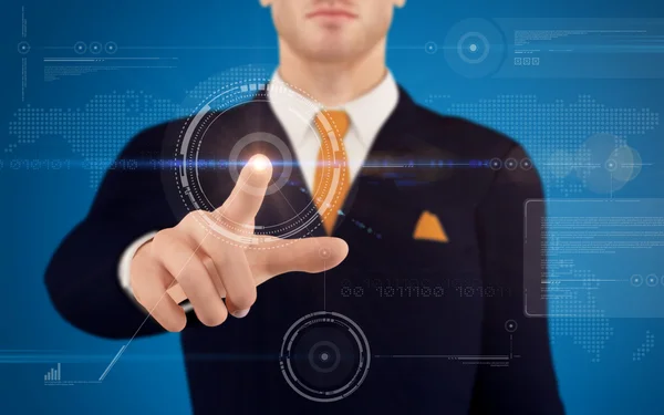 Businessman pushing on a touch screen button — Stock Photo, Image