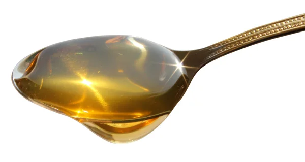 Honey dripping Stock Image