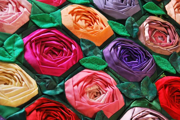 Patchwork quilt with flowers — Stock Photo, Image