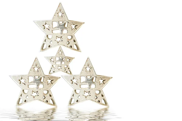 Blanco Navidad Saludo cuatro estrellas de plata —  Fotos de Stock