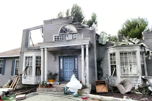 House damaged by disaster Stock Photo