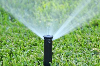 Automatic lawn sprinkler clipart