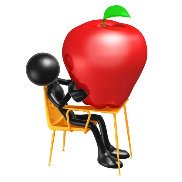 Student med jätten apple på skrivbord — Stockfoto