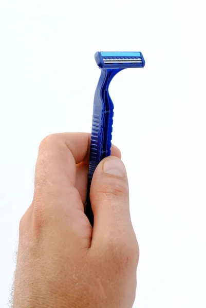 Ember kezében a blu eldobható borotva — Stock Fotó