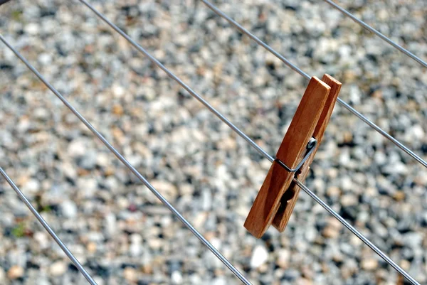 Clothes peg standing on the line — Stock Photo, Image