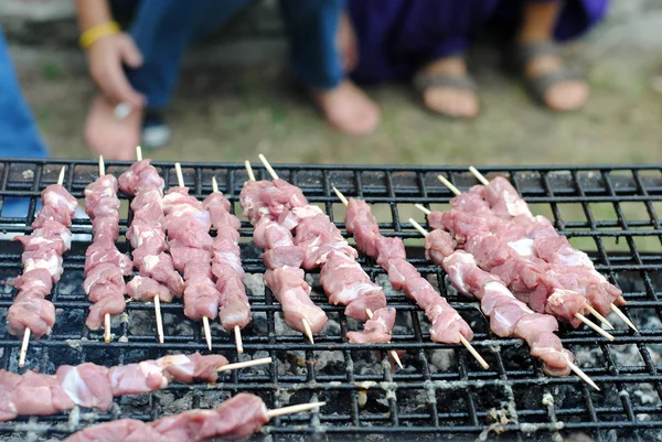 Lamb kabobs grilled on skewers, and foot on background — Stock Photo, Image