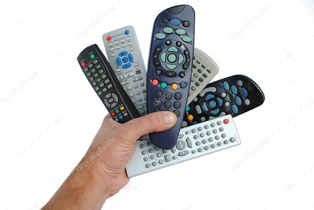 Man hand holds six remote control, isolated on white background