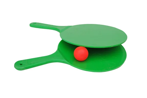 Dos raquetas verdes con una bola aislada sobre fondo blanco Imagen De Stock