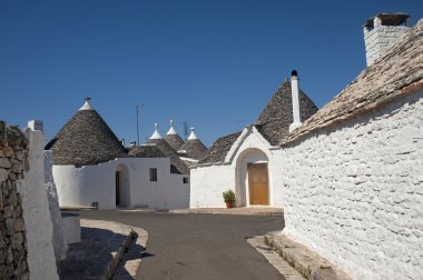 Alberobello (Bari, Puglia, Italy): Street in the trulli town clipart