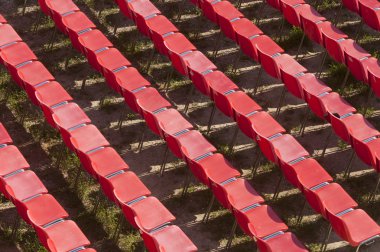 Lecce (Puglia, Italy): red empty chairs in the Roman theatre clipart