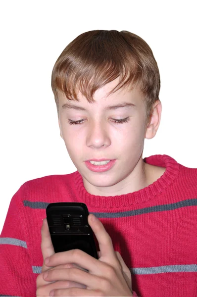Мальчик держит в руках мобильный телефон — Stock Photo, Image
