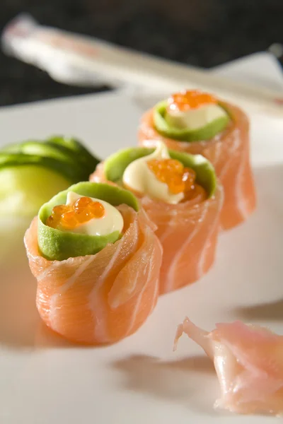 Três rolos de sushi — Fotografia de Stock