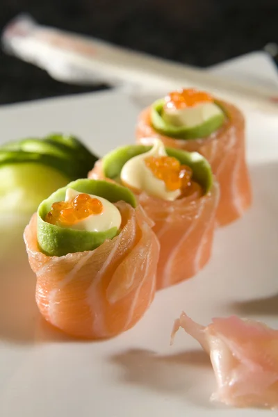 Três rolos de sushi — Fotografia de Stock