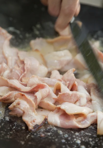 Frying bacon — Stock Photo, Image