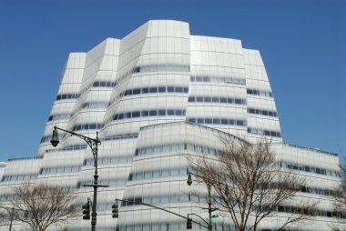 Futuristic white office building in New York City clipart