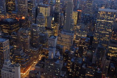 Aerial view over New York City at night clipart