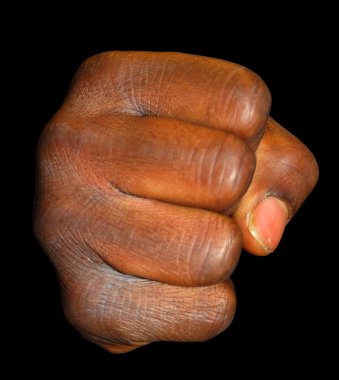 Black fist isolated on black background clipart
