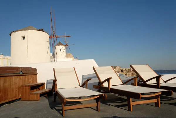 Sunlounger at the terrace in Santorini, Greece — Stok fotoğraf