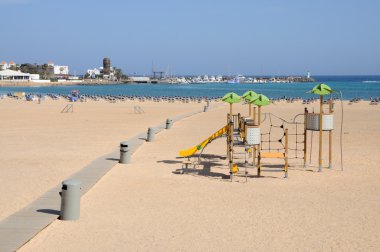 Beach in Caleta de Fuste, Canary Island Fuerteventura, Spain clipart