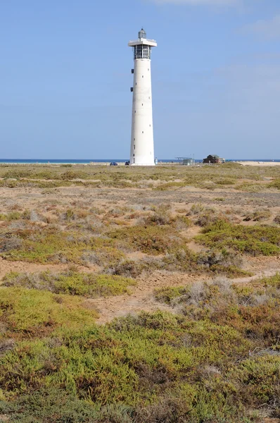 Salt marsh och fyr jandia playa, fuerteventura — Stockfoto