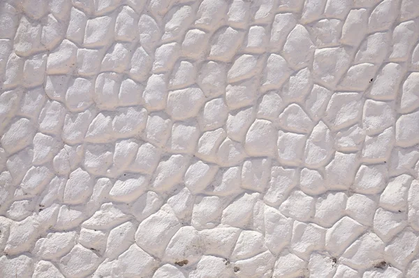 Белая каменная стена в Лас-Плейитас, Канарский остров Фуэртевентура, Испания — стоковое фото