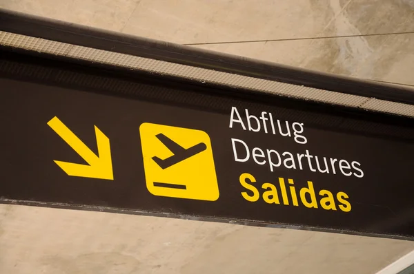 Airport departure sign in Spain — Stock Photo, Image