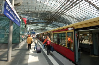 Train in the Berlin's main train station clipart