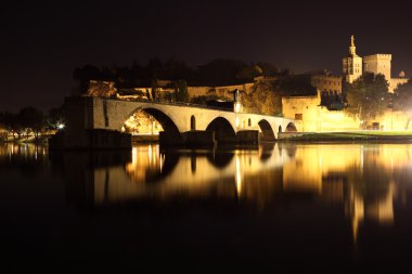 Pope's Palace and the ancient bridge in Avignon, France clipart