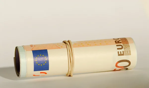Rouleau de billets en euros — Photo