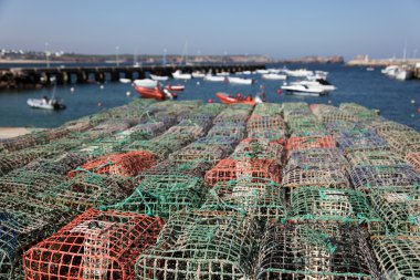 Lobster pots in a fishing village, Algarve Portugal clipart