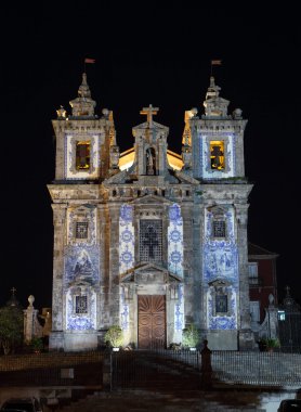 Santo Ildefonso Church illuminated at night, Oporto Portugal clipart