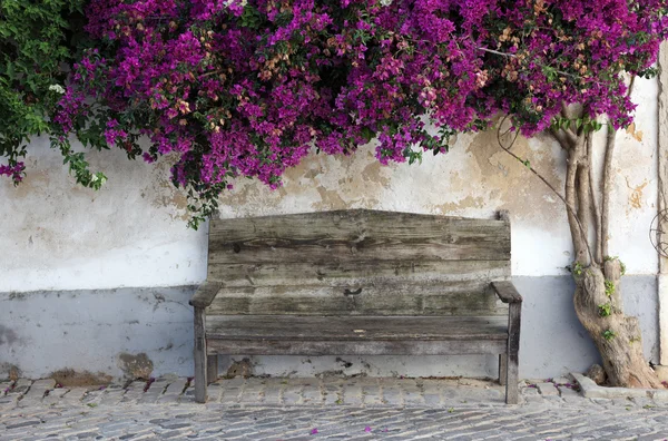 Wooden bench in the old town of Faro, Algarve Portugal — Stock Photo, Image
