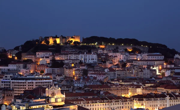 Staden Lissabon lluminated i skymningen, portugal — Stockfoto