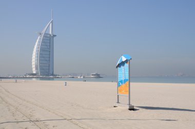 Jumeirah Beach and Burj Al Arab in Dubai clipart