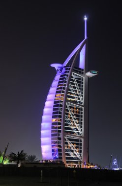 Hotel Burj Al Arab illuminated at night, Dubai clipart
