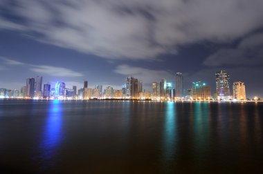 Sharjah City Skyline at dusk clipart