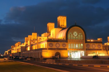 Central Souq in Sharjah City at dusk clipart