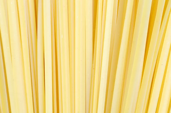 Raw linguine pasta closeup — Stock Photo, Image