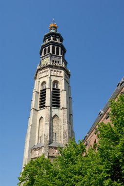 Bell tower of the medieval Cathedral in Middelburg, the Netherlands clipart